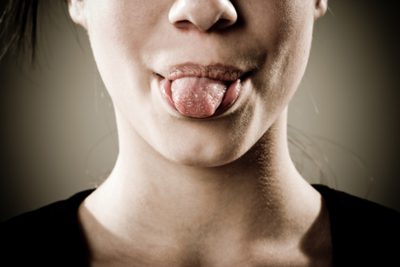 Orsaker till en ömma tunga