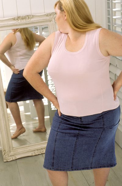 كيفية إخفاء الدهون في الجسم مع الملابس