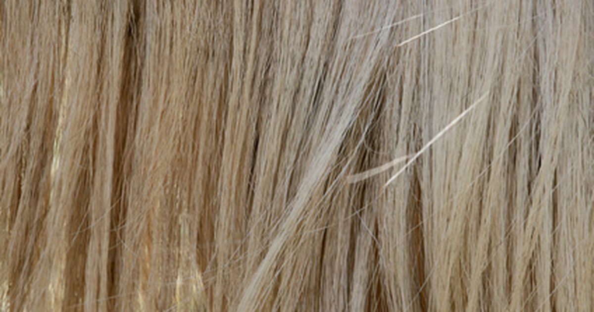 Wat veroorzaakt menselijk haar om grijs te worden?