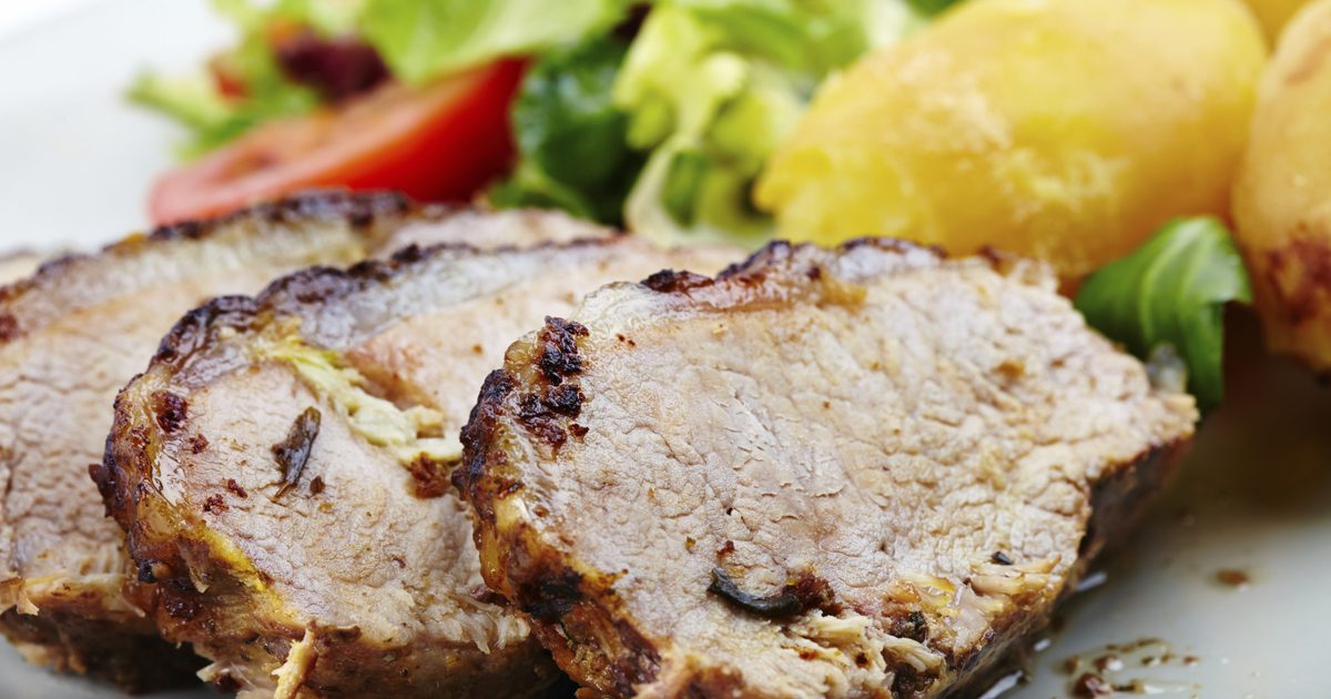 كم عدد السعرات الحرارية في 4 أونصة من لحم المتن لحم الخنزير؟