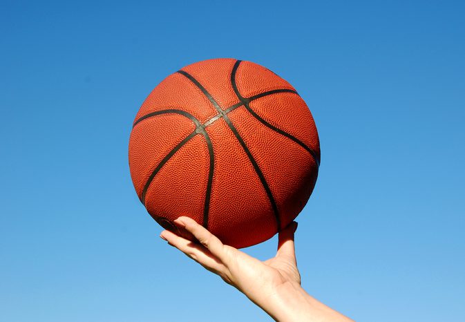 Driller å lære å Palm en Basketball